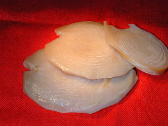 Sliced abalonesteaks before pounding